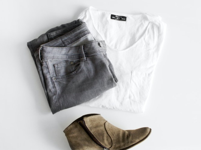 Folded apparel and a boot, the stock a footwear and apparel operation holds